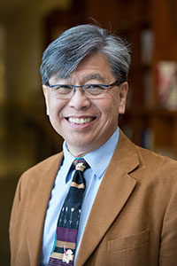Ed Liu in a brown jacket