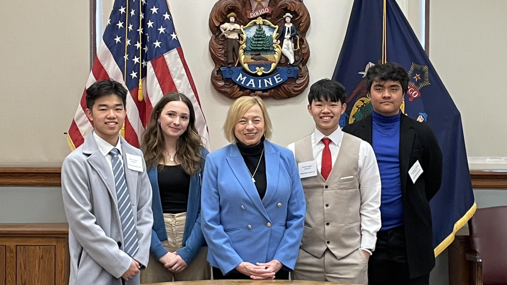 Maine Governor Janet Mills (center) and the Maine State Science Fair Grand Award winners.