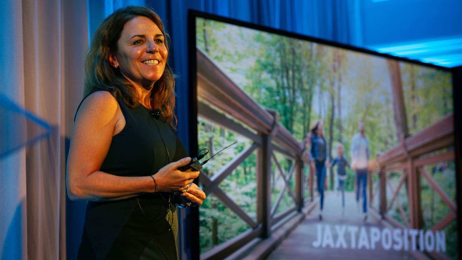 JAX researcher Cat Lutz speaking at a JAXtaposition conference in 2018