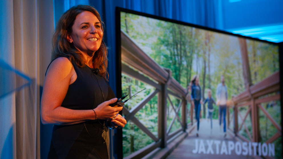 JAX neuroscientist Cat Lutz, Ph.D., gave a TED-style talk about strides in rare disease research as part of the Laboratory’s JAXtaposition speaker series. Photo by Brian Fitzgerald.