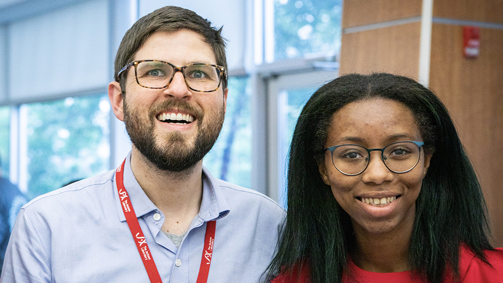 Violet Kimble with Michael Saul, Ph.D., her postdoctoral mentor, pictured at the 2019 Summer Student commencement ceremony. 