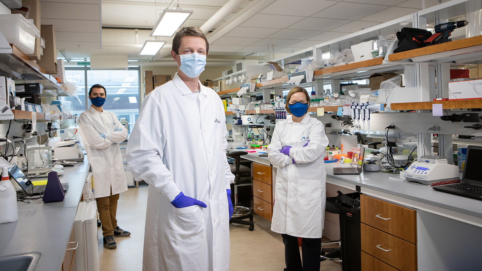 The Jackson Laboratory's Ryan Tewhey standing with his lab staff. Photo credit: Tiffany Laufer
